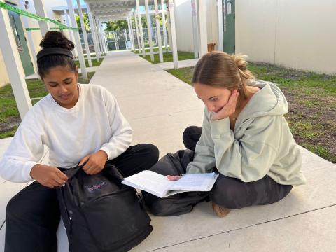 two female students outside