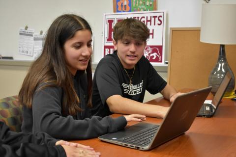 students on laptop