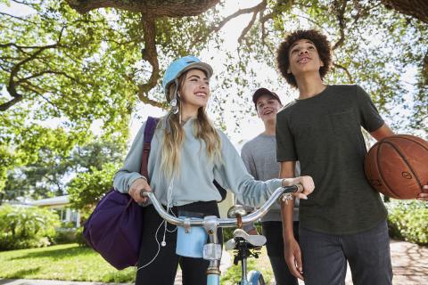 students with bike and basketball